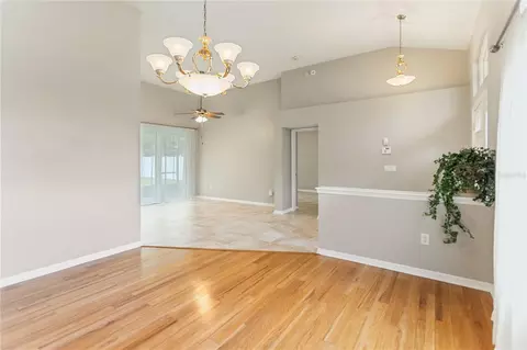 Living - 28402 Openfield Loop, Wesley Chapel, FL 33543 photo 6 of 13