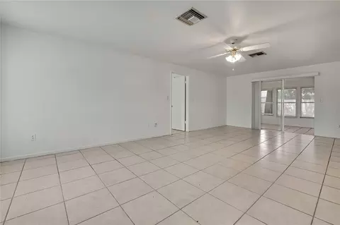 Living - 7545 Pinehurst Dr, Spring Hill, FL 34606 photo 4 of 6