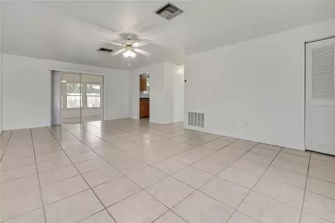 Living - 7545 Pinehurst Dr, Spring Hill, FL 34606 photo 3 of 6