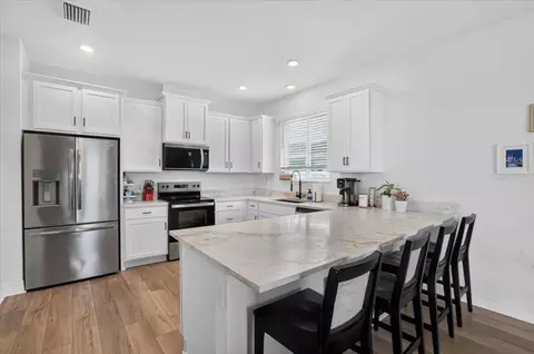 Kitchen - 10971 Bluestem Cv, Parrish, FL 34219 photo 1 of 2