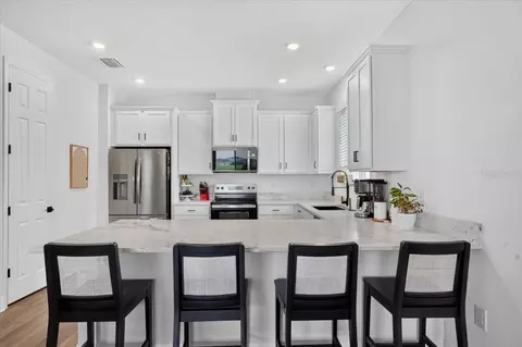 Kitchen - 10971 Bluestem Cv, Parrish, FL 34219 photo 2 of 2