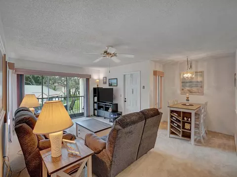 Living - 13122 Slash Pine Dr #E2, Hudson, FL 34669 photo 2 of 3