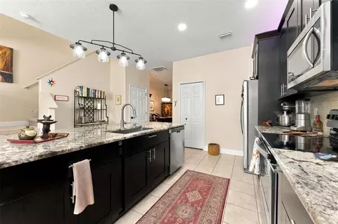 Kitchen - 9234 Stone River Pl, Riverview, FL 33578 photo 3 of 7