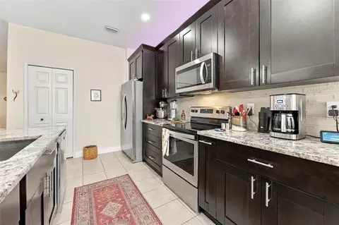 Kitchen - 9234 Stone River Pl, Riverview, FL 33578 photo 5 of 7