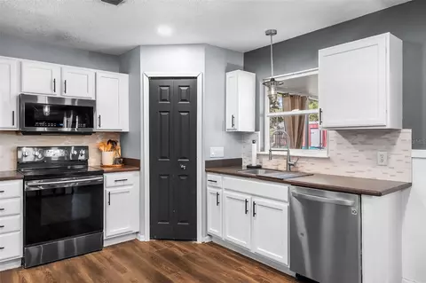 Kitchen - 8295 Begonia St, Spring Hill, FL 34608 photo 5 of 6