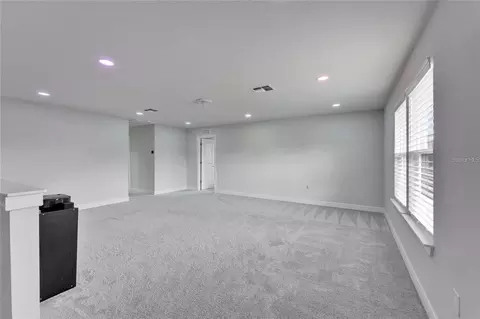 Living - 6658 Devlin Ln, Wesley Chapel, FL 33545 photo 2 of 2