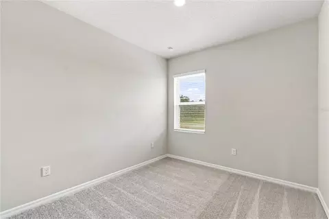 Bedroom - 5617 White Ibis Pt, Saint Cloud, FL 34772 photo 5 of 8