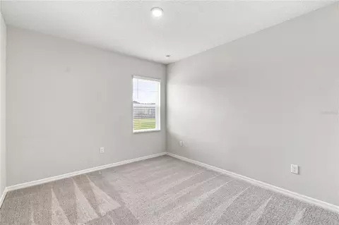 Bedroom - 5617 White Ibis Pt, Saint Cloud, FL 34772 photo 7 of 8