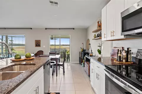 Kitchen - 31713 Sun Kettle Loop, Wesley Chapel, FL 33545 photo 5 of 5