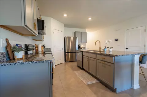 Kitchen - 9072 Forge Breeze Loop, Wesley Chapel, FL 33545 photo 3 of 5