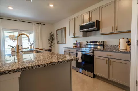 Kitchen - 9072 Forge Breeze Loop, Wesley Chapel, FL 33545 photo 5 of 5