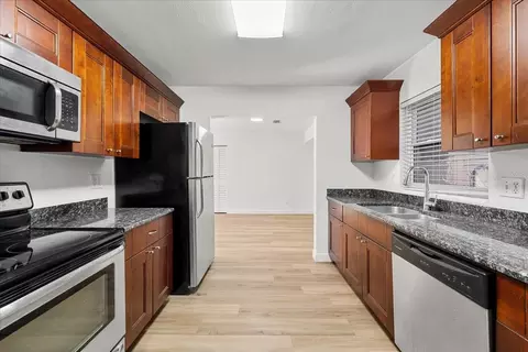 Kitchen - 711 14th St, Palm Harbor, FL 34683 photo 1 of 3