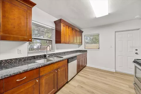 Kitchen - 711 14th St, Palm Harbor, FL 34683 photo 3 of 3