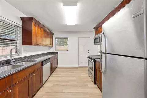 Kitchen - 711 14th St, Palm Harbor, FL 34683 photo 2 of 3