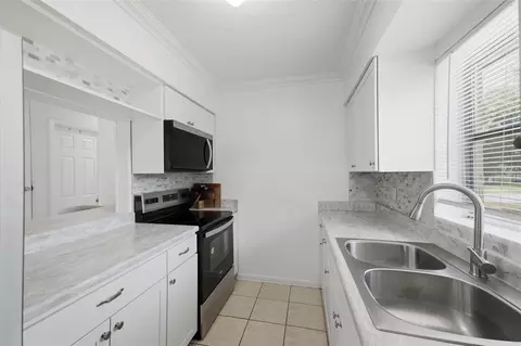 Kitchen - 520 Copperfield Rd, Spring Hill, FL 34606 photo 3 of 4