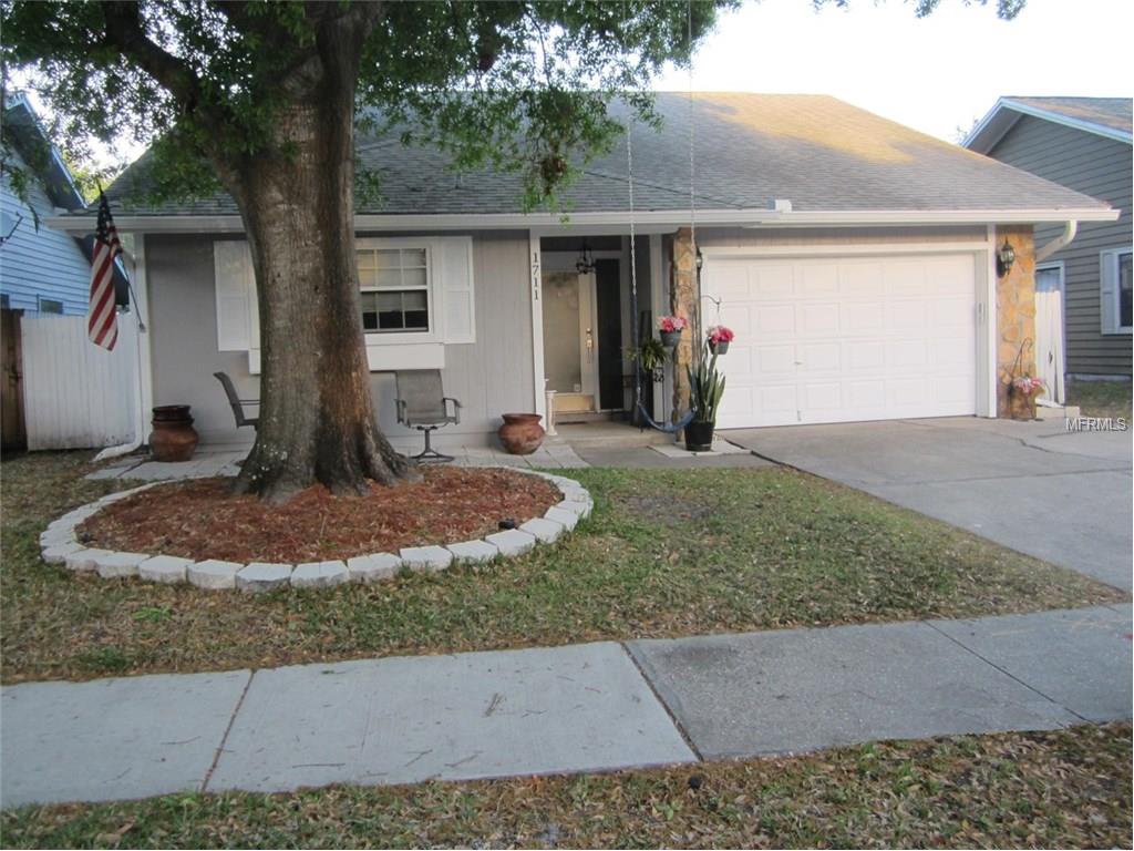 1711 Whispering Dr E, Largo, FL 33771 photo 1