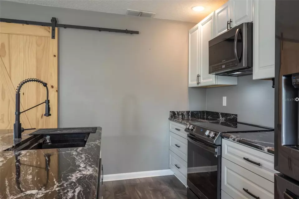 Kitchen - 3339 Croton Ave, Deltona, FL 32738 photo 2 of 5