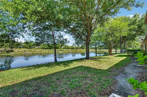 Exterior - 715 Cobblestone Dr, Ormond Beach, FL 32174 photo 11 of 14