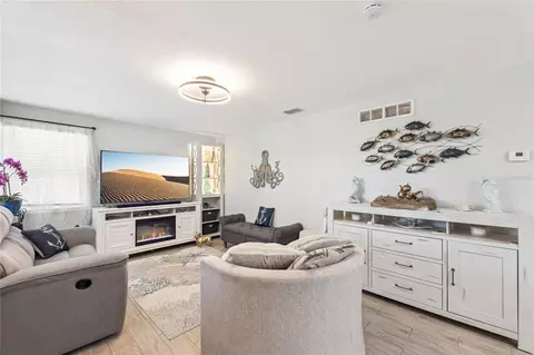Living - 400 S Ridgewood Ave, Ormond Beach, FL 32174 photo 2 of 2