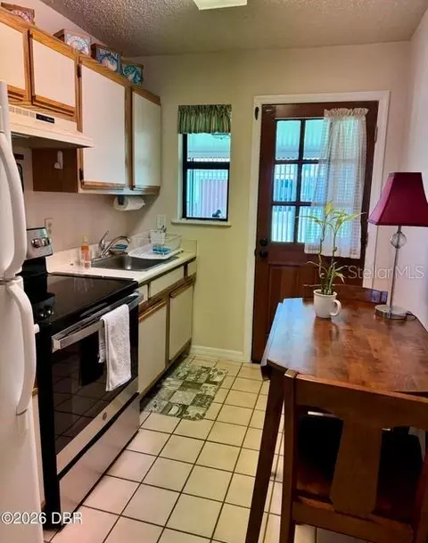 Kitchen - 156 Cardinal Dr #A, Ormond Beach, FL 32176 photo 2 of 2