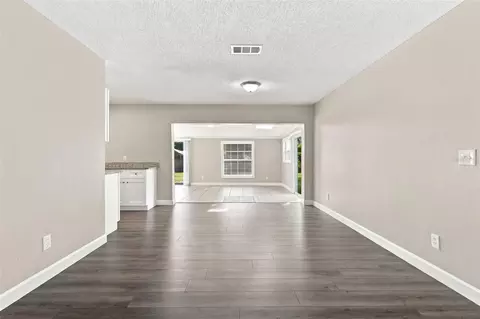 Living - 3307 Pine Tree Dr, Edgewater, FL 32141 photo 8 of 19