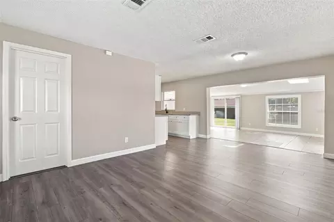 Living - 3307 Pine Tree Dr, Edgewater, FL 32141 photo 7 of 19