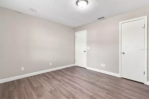 Bedroom - 3307 Pine Tree Dr, Edgewater, FL 32141 photo 2 of 7