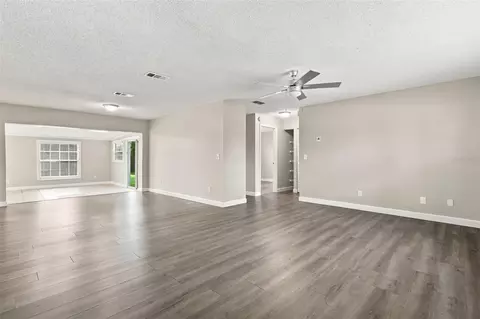 Living - 3307 Pine Tree Dr, Edgewater, FL 32141 photo 1 of 19