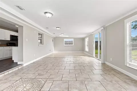 Living - 3307 Pine Tree Dr, Edgewater, FL 32141 photo 10 of 19