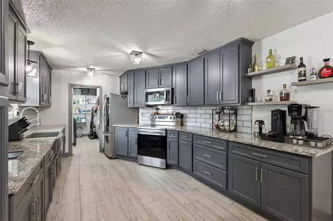 Kitchen - 1629 Orange Tree Dr, Edgewater, FL 32132 photo 4 of 5
