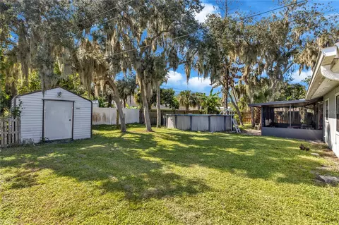 Exterior - 2512 Pine Tree Dr, Edgewater, FL 32141 photo 4 of 8