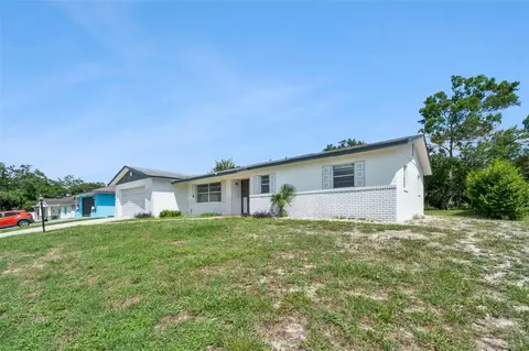 Exterior - 1679 E Apache Cir, Deltona, FL 32725 photo 5 of 9