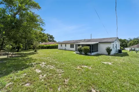 Exterior - 1679 E Apache Cir, Deltona, FL 32725 photo 8 of 9