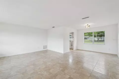 Living - 1679 E Apache Cir, Deltona, FL 32725 photo 2 of 6