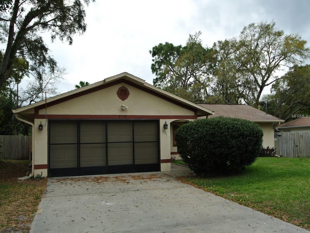 9170 Colmart St, Spring Hill, FL 34608 photo 1