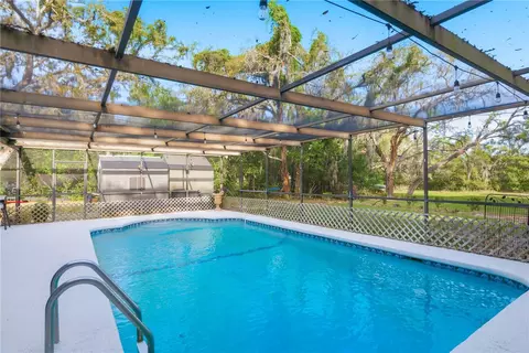 Exterior - 7487 Alhambra Ct, Spring Hill, FL 34606 photo 10 of 19