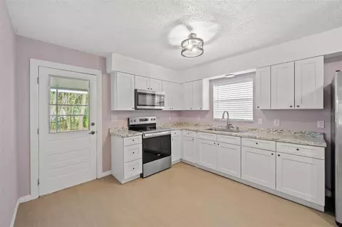 Kitchen - 4489 Fishman Ave, Weeki Wachee, FL 34607 photo 2 of 2