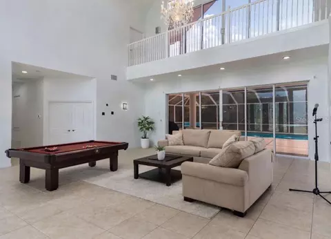 Living - 6151 New Osprey Pt, Weeki Wachee, FL 34607 photo 4 of 6