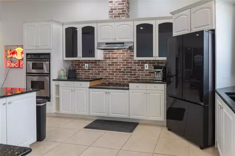 Kitchen - 6151 New Osprey Pt, Weeki Wachee, FL 34607 photo 3 of 8