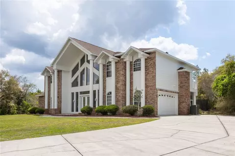 Exterior - 6151 New Osprey Pt, Weeki Wachee, FL 34607 photo 2 of 12