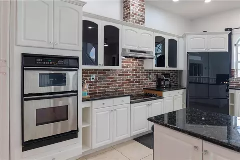 Kitchen - 6151 New Osprey Pt, Weeki Wachee, FL 34607 photo 8 of 8