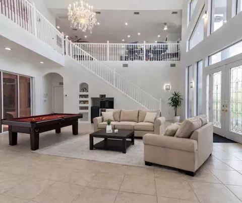 Living - 6151 New Osprey Pt, Weeki Wachee, FL 34607 photo 5 of 6