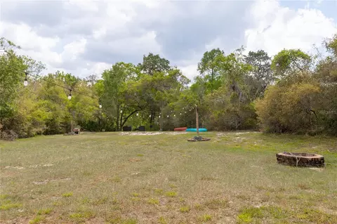 Exterior - 6151 New Osprey Pt, Weeki Wachee, FL 34607 photo 4 of 12