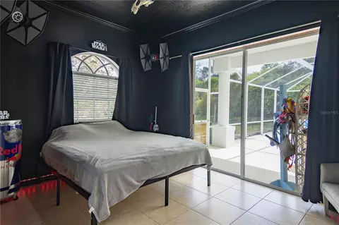 Bedroom - 6151 New Osprey Pt, Weeki Wachee, FL 34607 photo 1 of 4