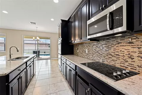 Kitchen - 18696 Malinche Loop, Spring Hill, FL 34610 photo 2 of 3