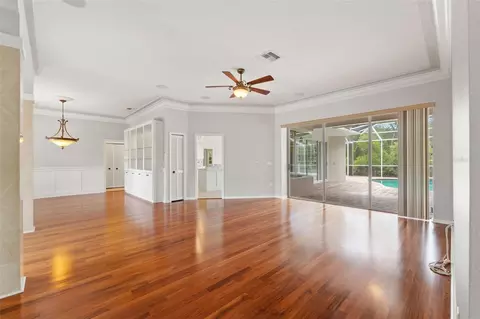 Living - 6153 New Osprey Pt, Weeki Wachee, FL 34607 photo 3 of 10