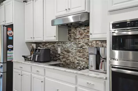 Kitchen - 14100 Bassingthorpe Dr, Spring Hill, FL 34609 photo 4 of 10