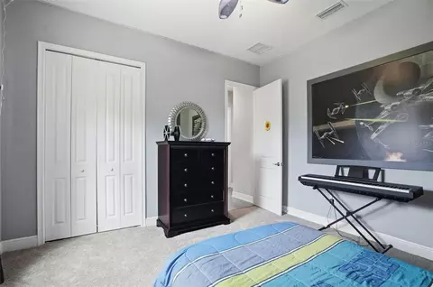 Bedroom - 14100 Bassingthorpe Dr, Spring Hill, FL 34609 photo 11 of 13