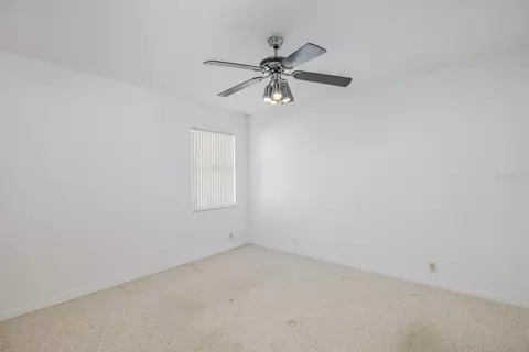 Bedroom - 8912 Thoreau Pl, Hudson, FL 34667 photo 5 of 9