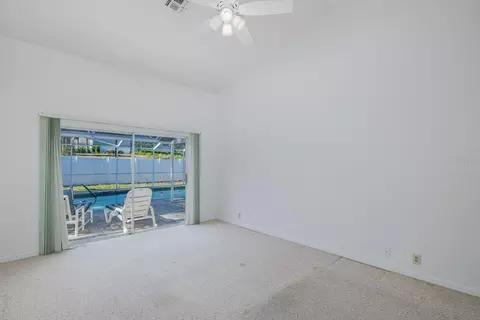 Bedroom - 8912 Thoreau Pl, Hudson, FL 34667 photo 3 of 9